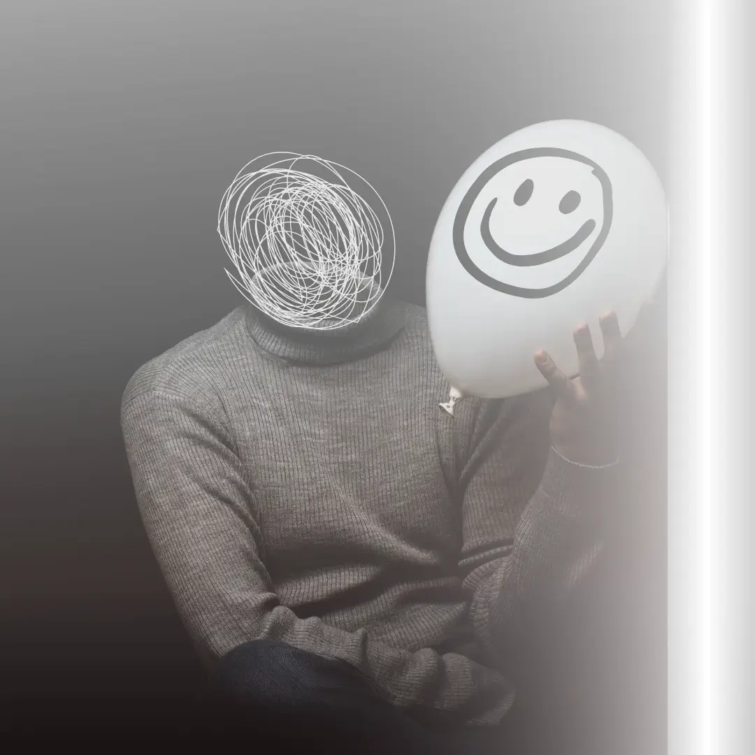 a person sitting holding a balloon with a smiley face drawn on it, in place of the person's head is a squiggly circle